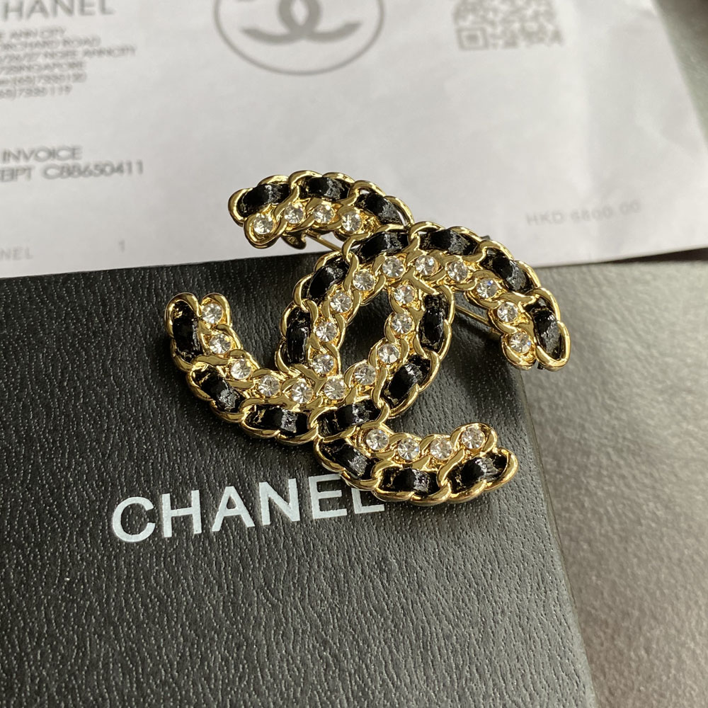 Chanel Gold And Leather Brooch Cc 23003