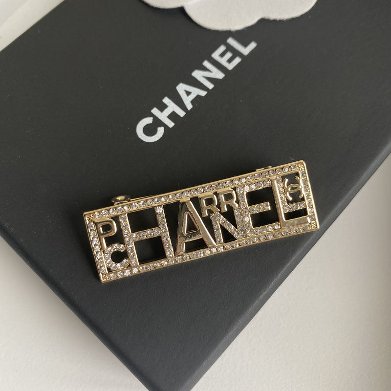 Chanel Gold Text Brooch Cc 23093